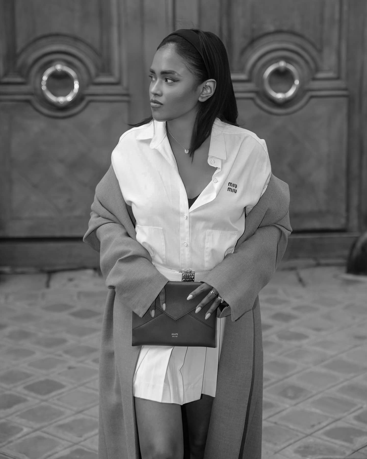 From the Parisian camera roll 🤍 @miumiu 

Skirt, shirt and heels : @miumiu 
Clutch: @khaite_ny

#fallfashion #autumnstyle #autumnoutfit